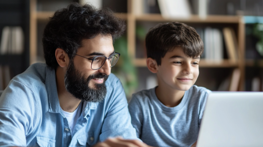 American_father_and_his_son_they_are_learning_Arabi